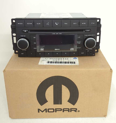 New OEM Mopar AM FM 6 CD MP3 WMA Radio 2008-2010 models REQ scratched 5064941AD