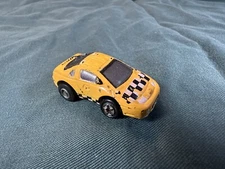 Vintage Micro Machines Crankers Wind Up Nissan Crash Taxi  (Works)