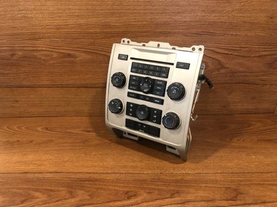 09-12 FORD ESCAPE MARINER STEREO AC CLIMATE CONTROL SWITCH FACE BEZEL RADIO OEM