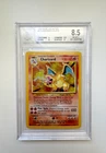 POKEMON - 1999 BASE SET #4 CHARIZARD-HOLO BGS 8.5