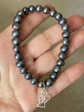 925 sterling silver angel charm 8mm freshwater pearl stretchy Bracelet