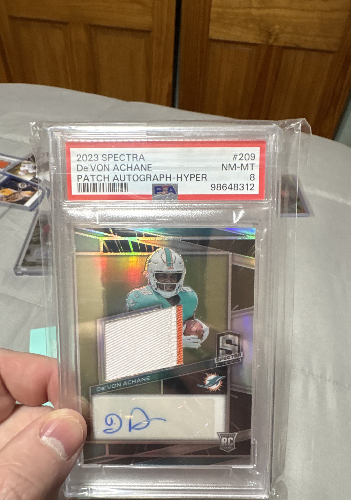 2023 Panini Spectra - Rookie Patch Autographs De'Von Achane #209 Hyper Prizm/60