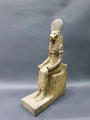 SEKHMET The Egyptian Warrior Goddess sitting on the chair & wearing the sun disk