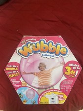 The amazing Wubble Super Wubble Bubble Ball great condition box is damaged ..