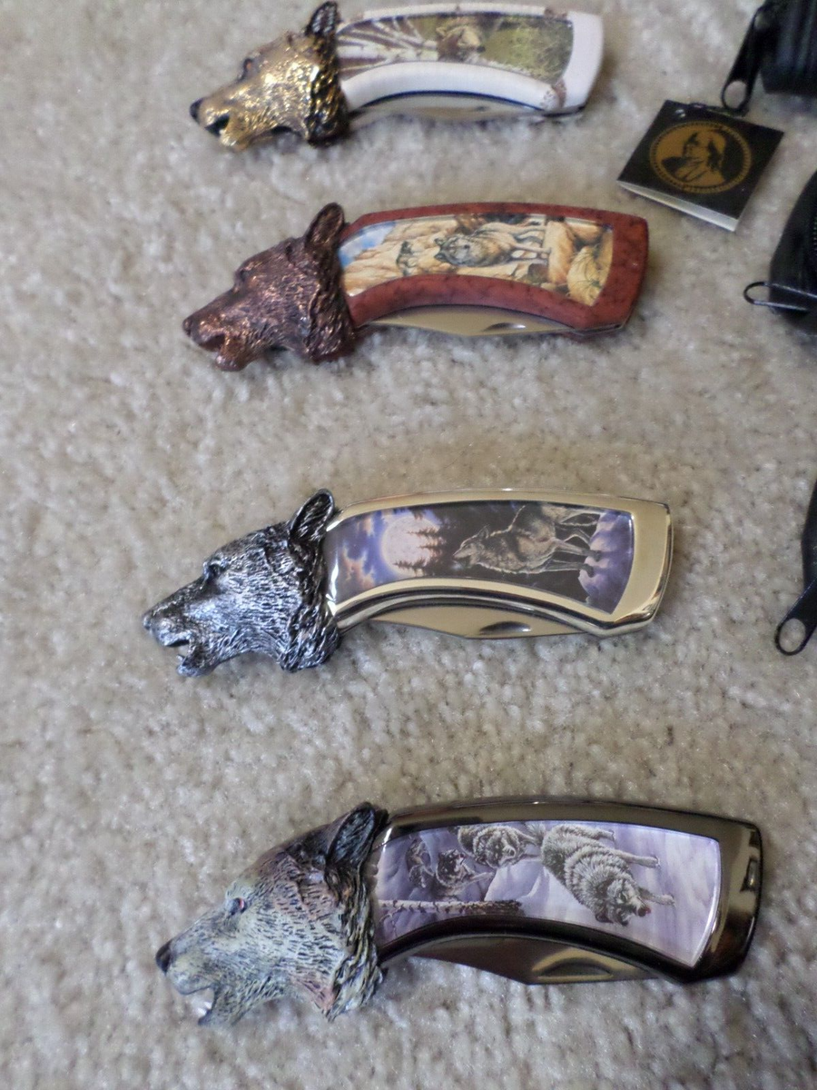 FRANKLIN MINT WOLF KNIVES Four by TED CROWN with pouches, COA's
