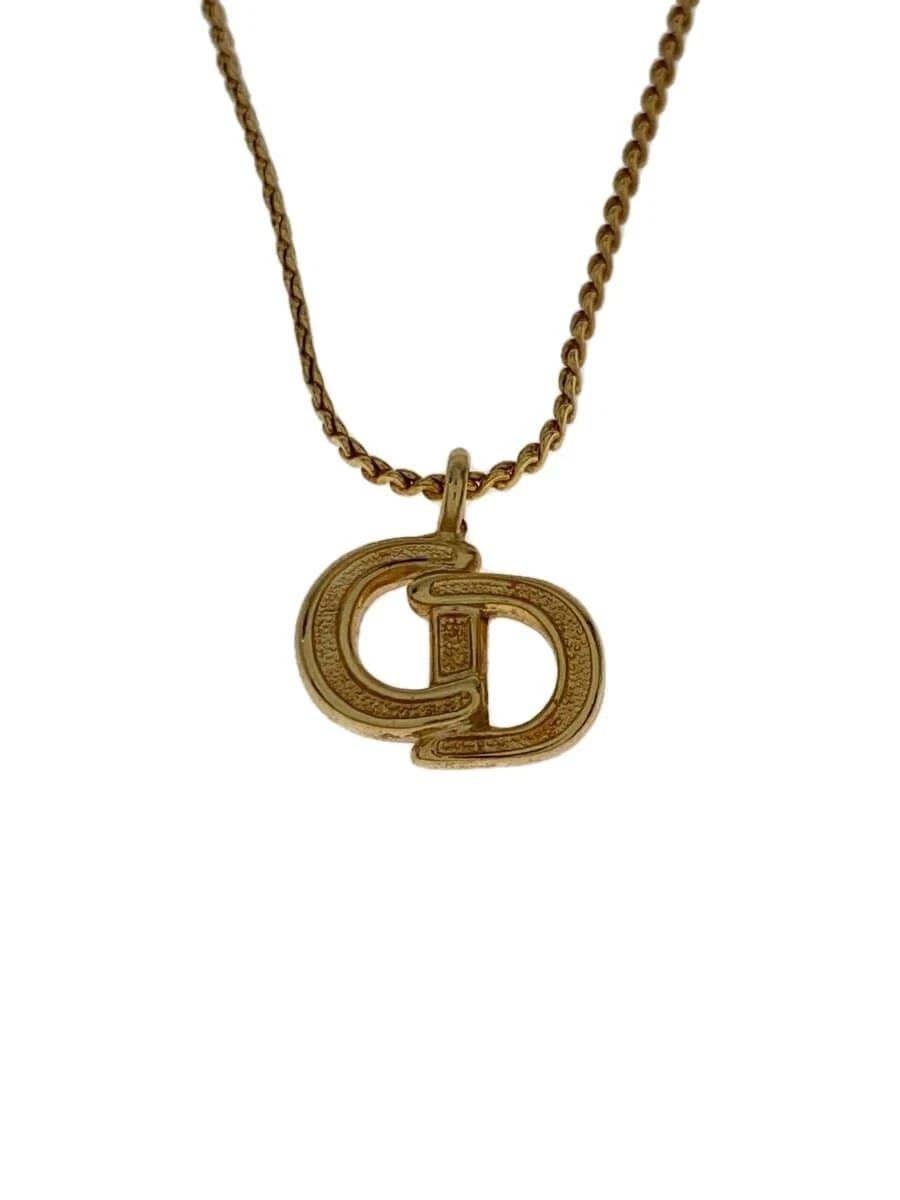 Collier Christian Dior    Femme avec haut doré