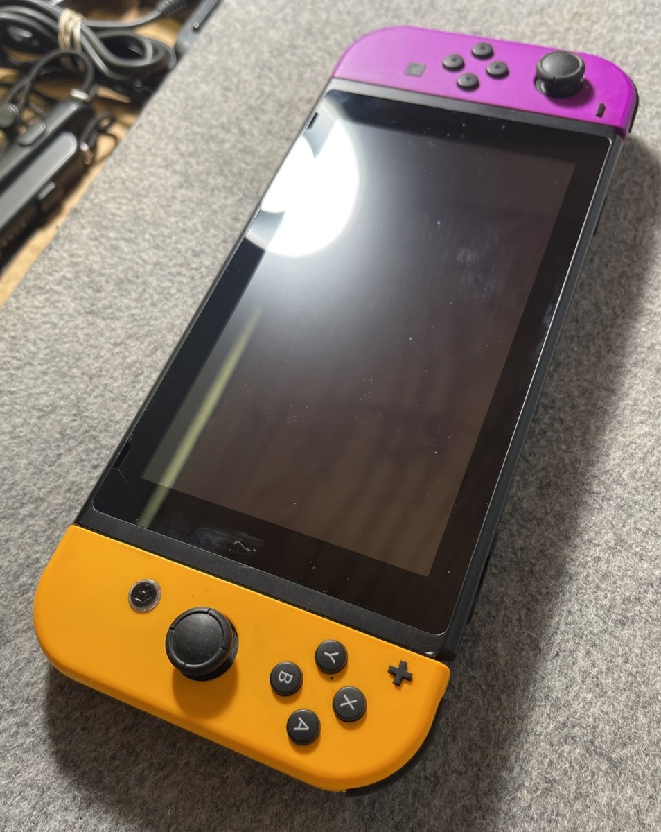 Nintendo Switch with Neon Purple and Neon Yellow Joy-Con