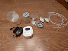 Breast pump Ameda AND Dr. Brown's Deluxe Bottle Warmer And Sterilizer Steam