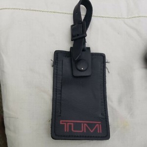 tumi leather luggage