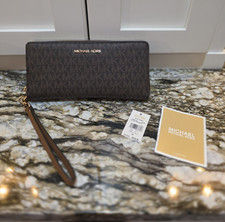 Michael Kors Brown Monogram Zip-Around Wristl...