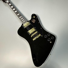 Custom black Firebird electric guitar gold hardware mahogany body
