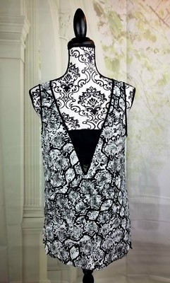 Express women's pullover sleeveless tank animal print top size m hi-lo b12