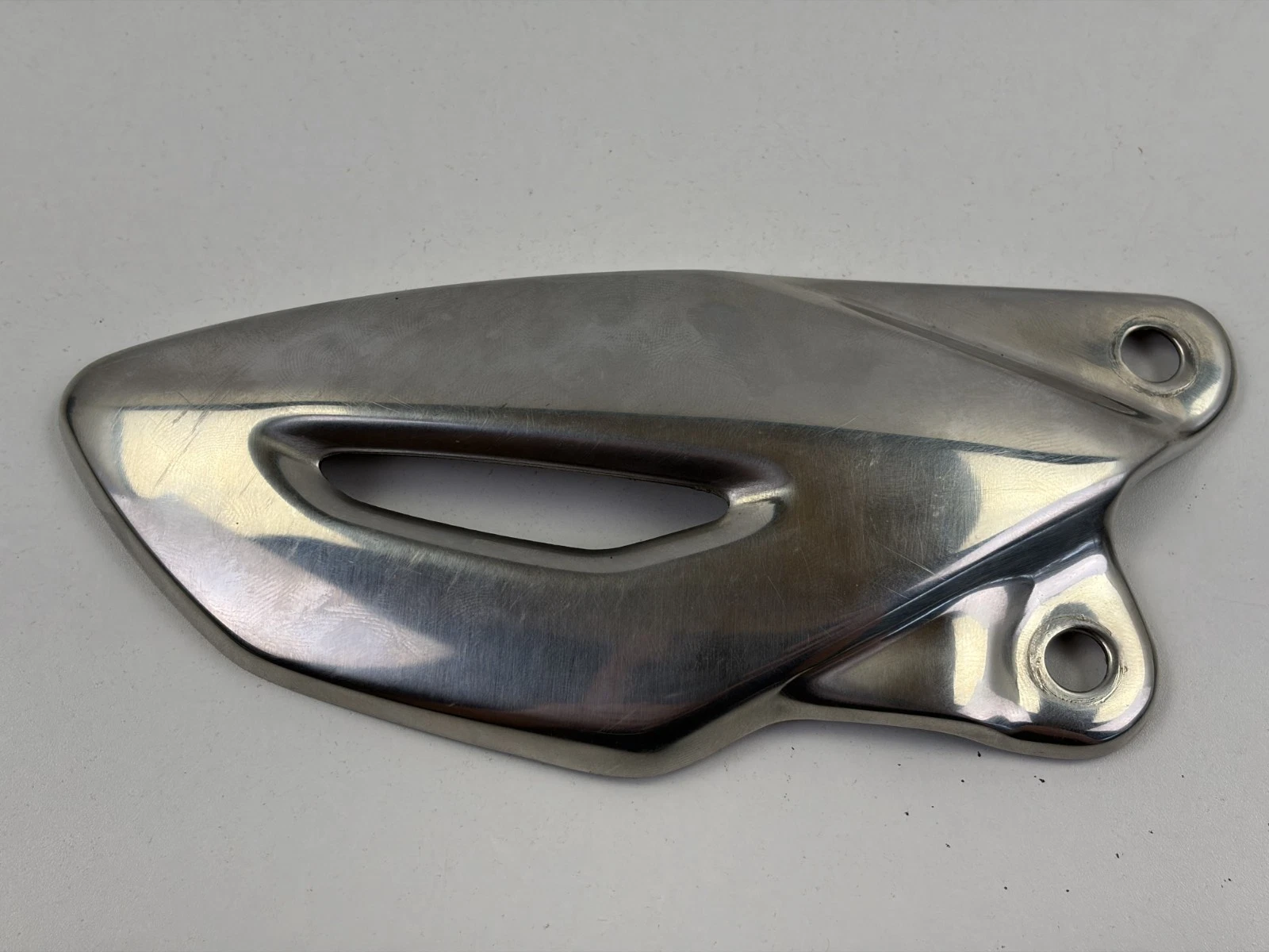2010 Triumph Street Triple 675 RH Right Heel Guard Cover T2082039 OEM