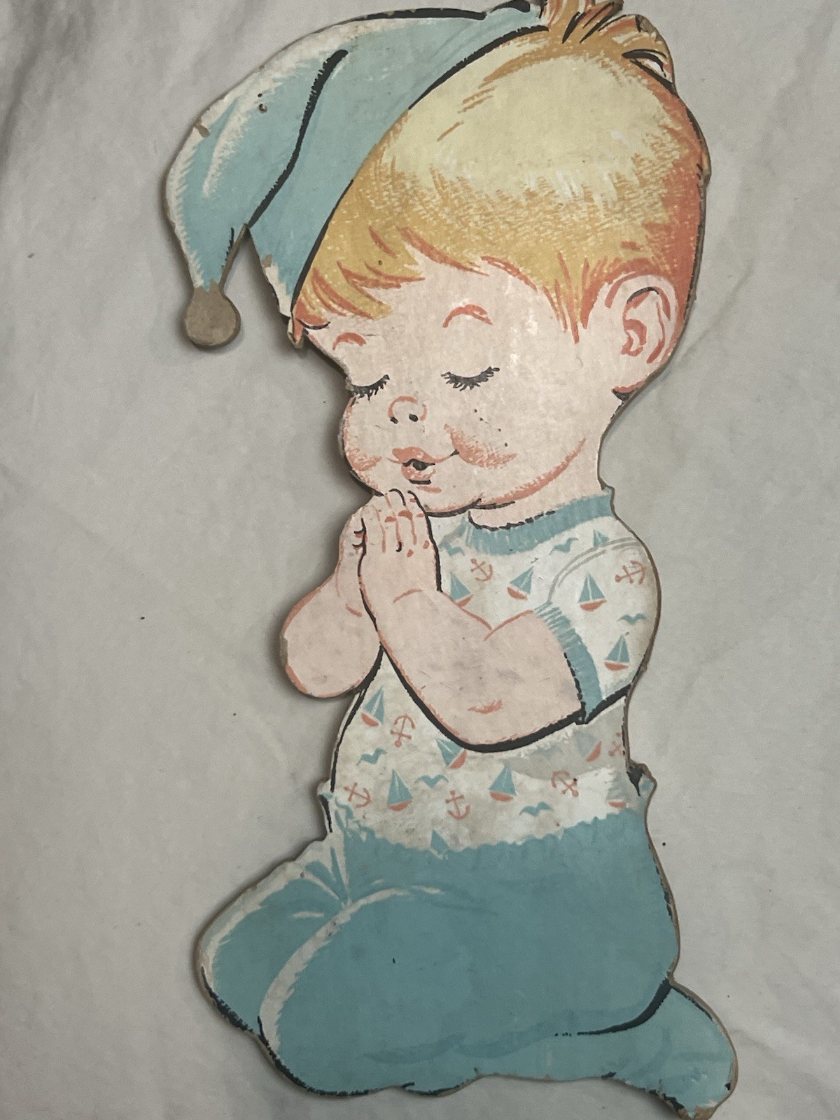 Vintage Style Nursery Wall Hanging Praying Baby in Blue Nightcap, Blue/White