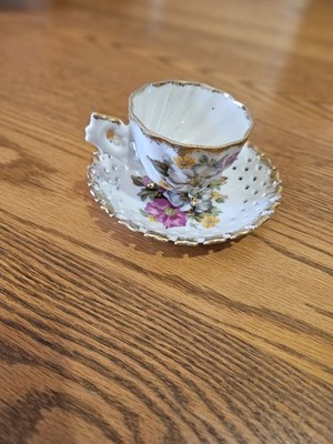 Fred Roberts Company Porcelain Teacup Three Footed Base Gold Trim and Saucer
