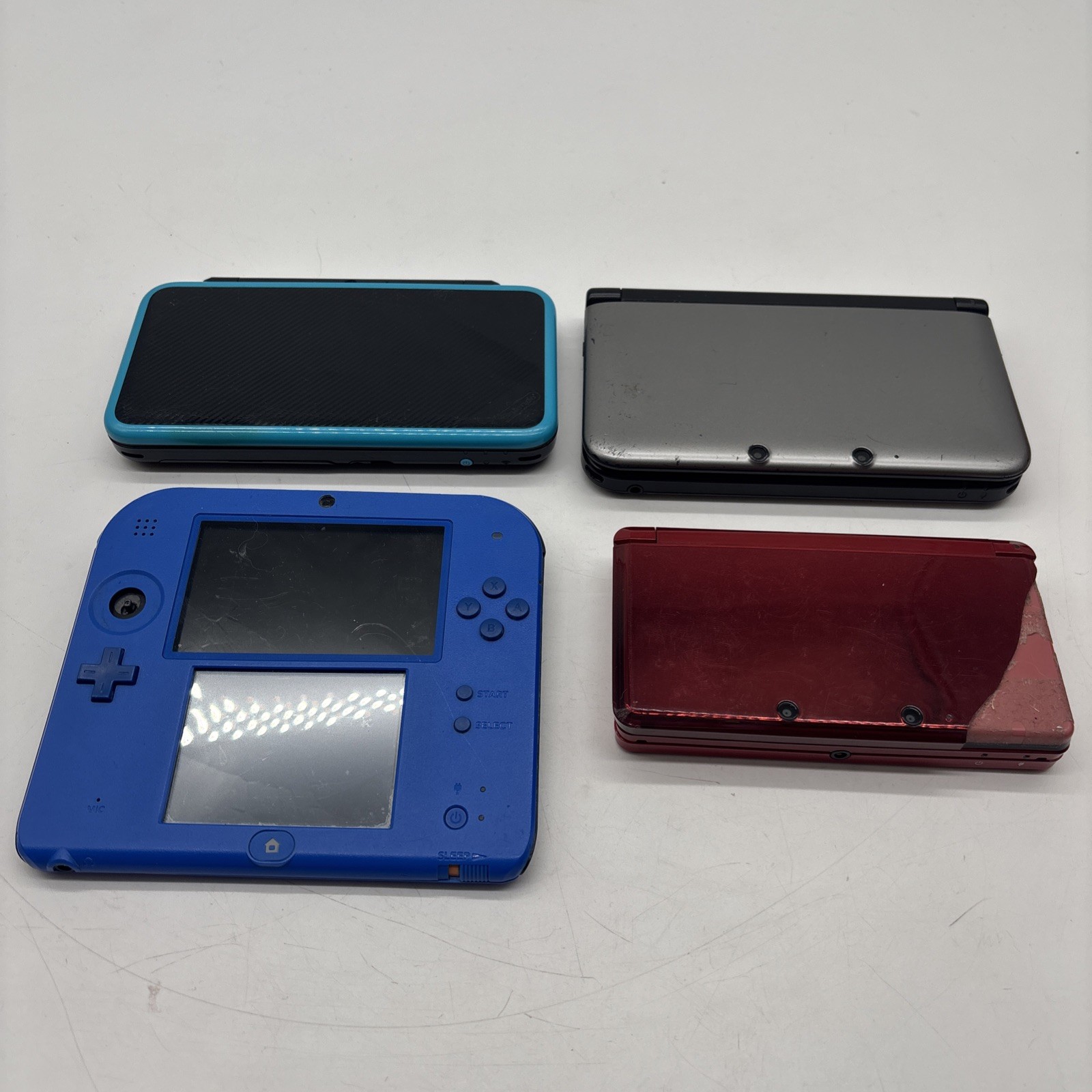 Lot Of 4 DS Consoles 3DS And 2DS All For Parts Or Repair