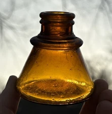NICE AMBER CONE INK BOTTLE - FLARED SHOULDER ANTIQUE BOTTLE HAND BLOWN 1890s