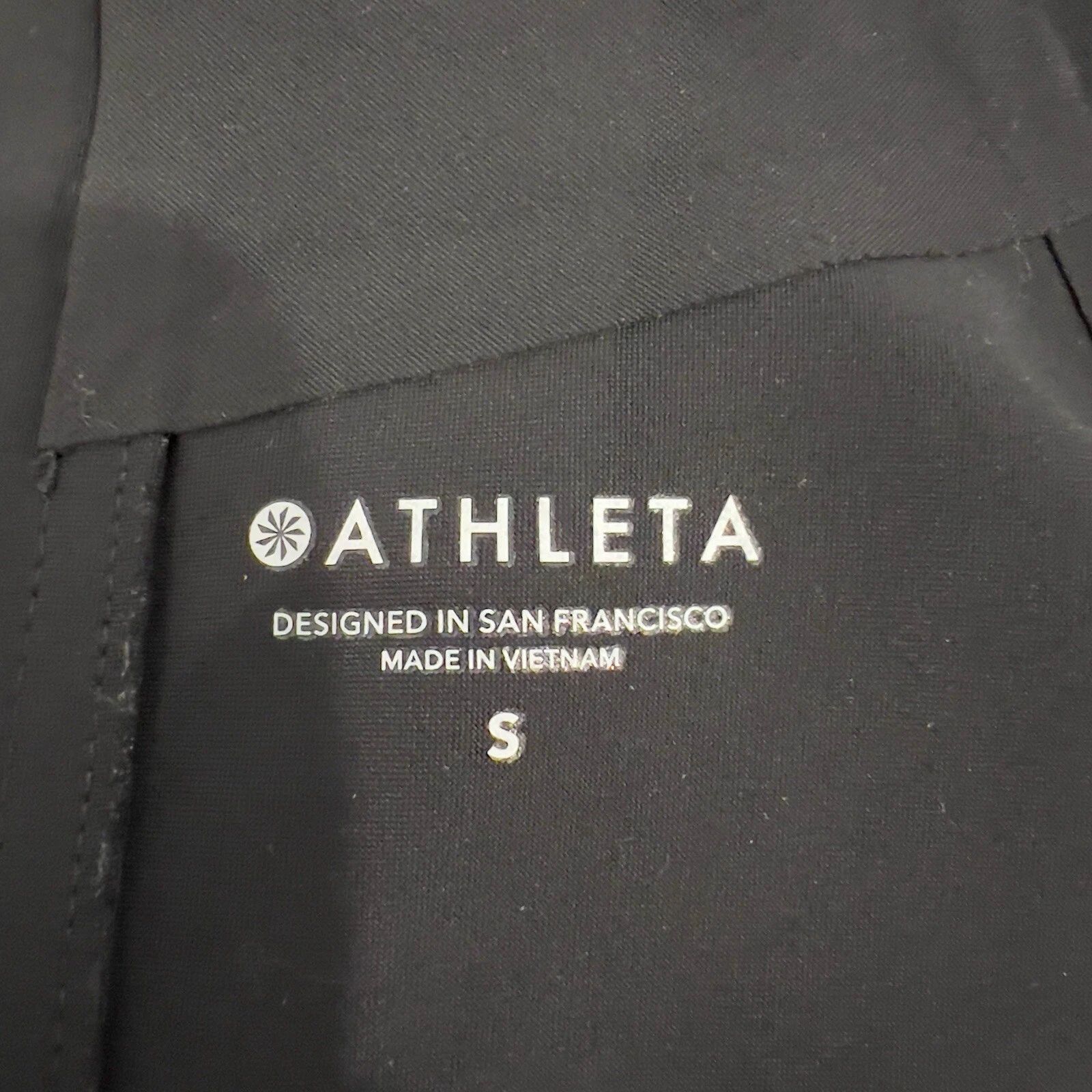 UNDERCOVER Athleta finto collo smanicato activewear mini abito donna taglia S nero zip laterale