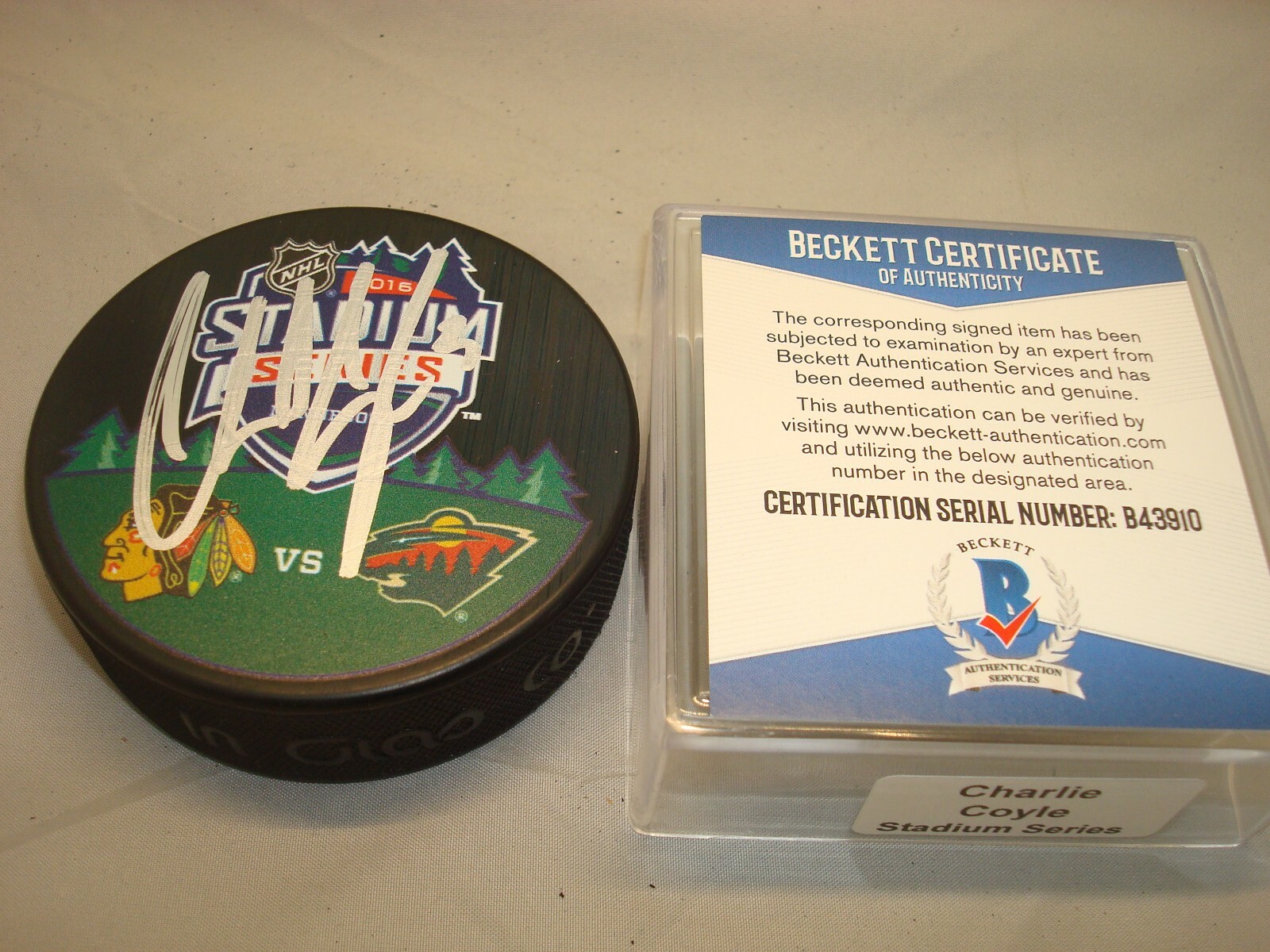 Charlie Coyle Autographed Signed Minnesota Wild Wild Stadium Series Hockey Puck Auto. Beckett BAS COA 1C 