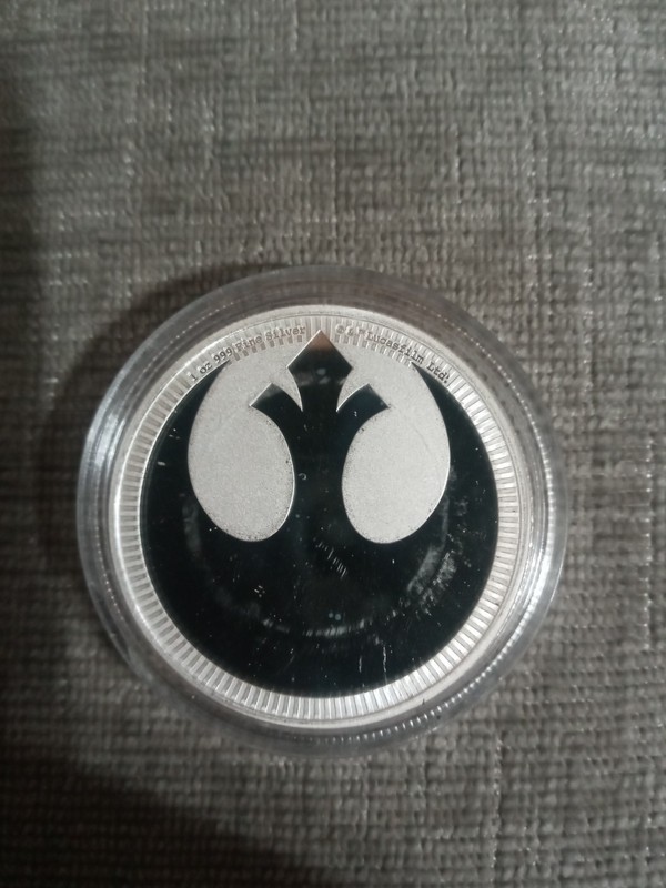 Uncirculated 2022 Niue Star Wars Rebel Alliance coin in capsule