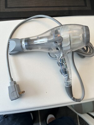 Drybar Buttercup Hair Blow-Dryer. Transparent Store Display.