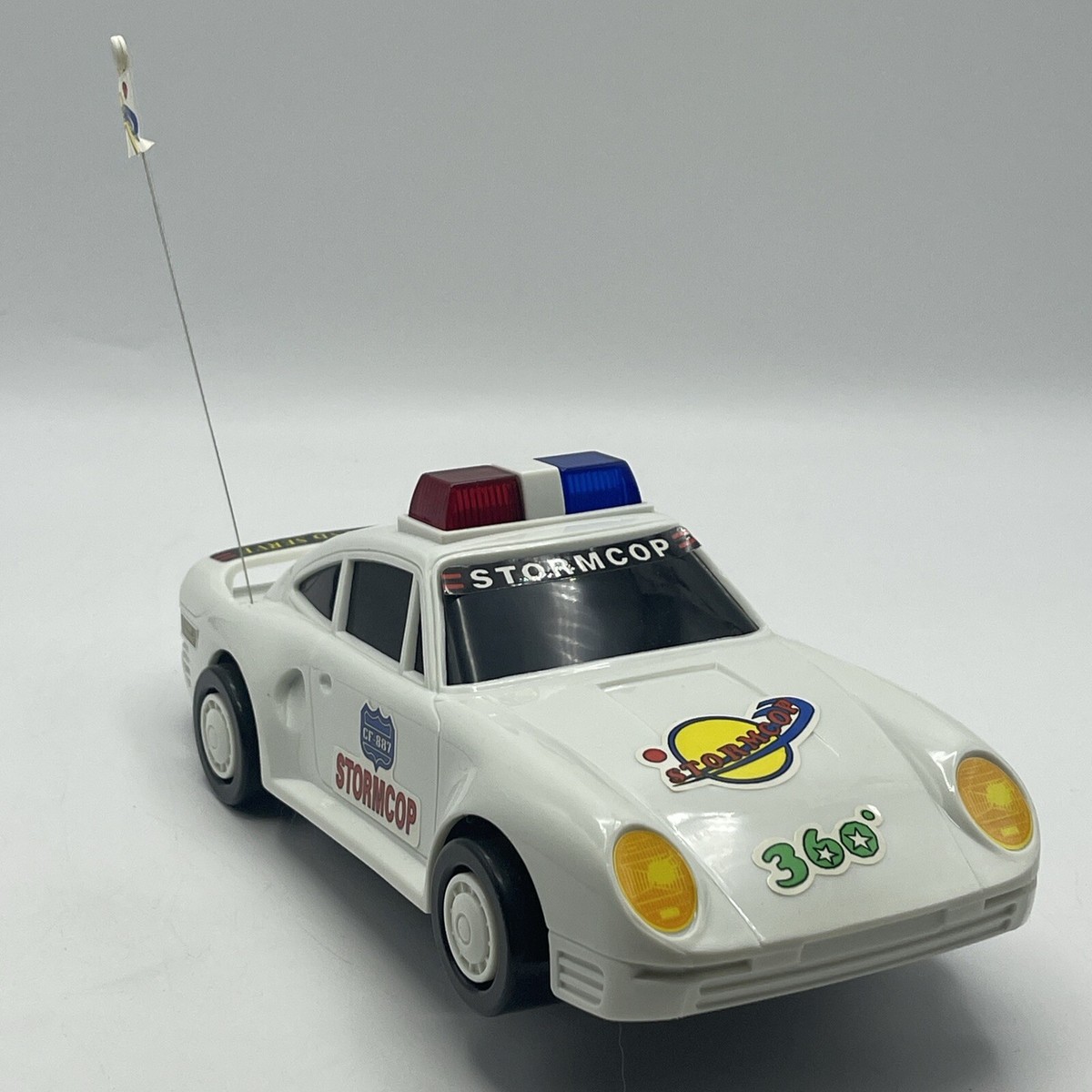 VINTAGE CHAIN FONG TOYS COSMOCOP ANIMATED TOY BUMP AND GO POLICE