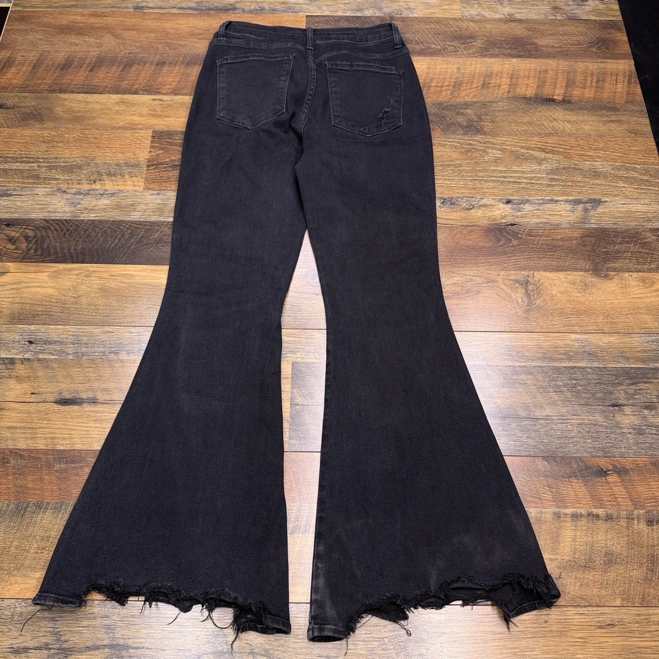 Pantalones de mezclilla Flying Monkey tiro alto súper acampanados para mujer 28 dobladillos deshilachados negros elásticos  Foto 2 de 4