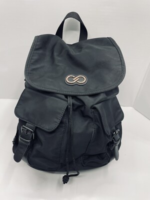 calia leather backpack Ella Mini and a padded laptop sleeve Top haul handle lets you grab and go Use the luggage sleeve for easy transport with the rest of your bags Calia by Carrie Underwood Beige