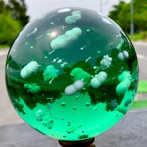 2.76LB Transparent green crystal ball with feather crystal mineral sphere - 第 16/24 張圖片