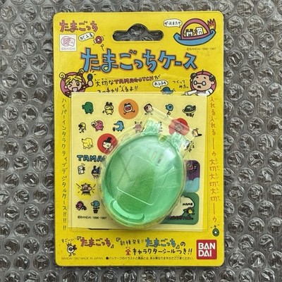 Bandai 1997 Official Tamagotchi New Species Clear Green Case +