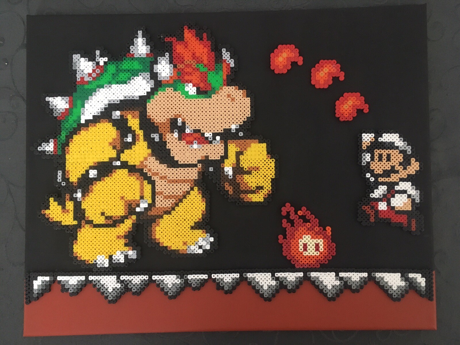 Perles à repasser tableau Mario contre Bowser idée cadeau geek originale