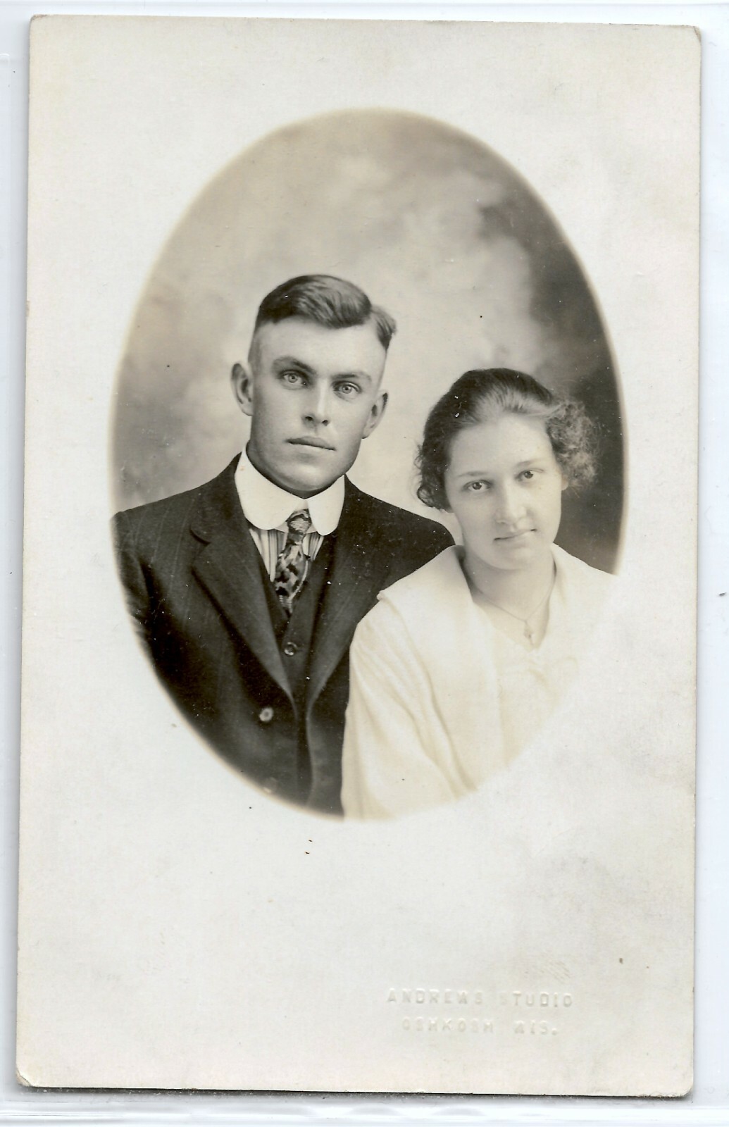 Handsome couple, fade haircut, Oshkosh, Wisconsin; photo postcard RPPC