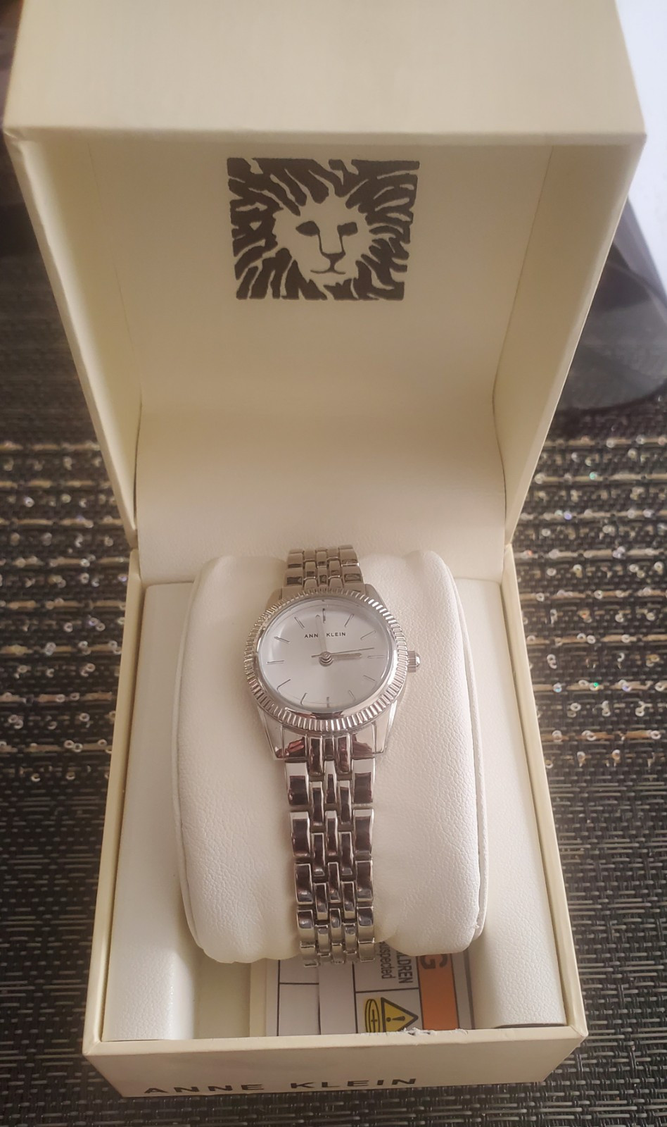 Anne Klein Women's Silver Watch with Lion King Embroidery Inside Band
