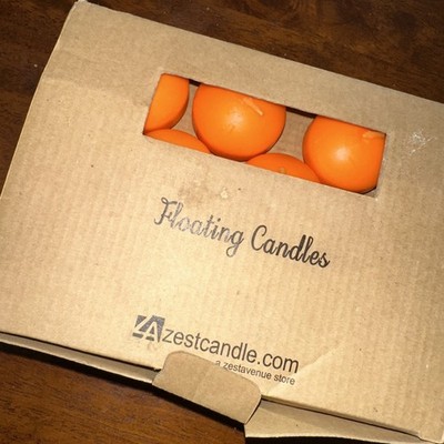 Zest Candle Floating Candles Orange Pack 18/24  1 3/4 Inch