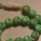 Vintage Hong Kong UV Reactive Lime Green Plastic Drum Bead Necklace Blacklight — photo 2