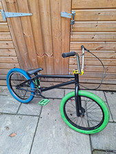 Radio BMX Bike 20in Black Frame Green Front Tyre Blue Rear Tyre 1-Speed U-Brake