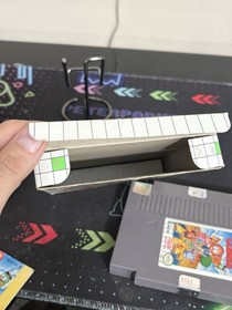 Kickle Cubicle (Nintendo Entertainment System, 1990) NES COMPLETO con manual de caja