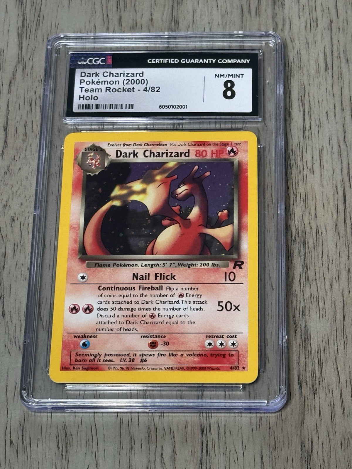 CGC 8 Dark Charizard 4/82 Holo Team Rocket Pokémon Card