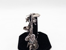 Vintage 1940s Sterling Silver MULTI CHARM 8 B...
