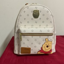 LOUNGEFLY DISNEY WINNIE THE POOH LETTERS MINI BACKPACK NWT