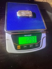 129 grams gold bar 4219.46 per troy oz
