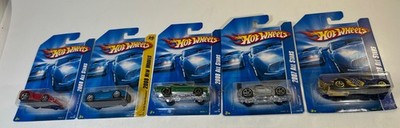 Hot Wheels 2007-08 Enzo Ferrari, Tesla Roadster, Plymouth, 41 Willys, Nissan L5