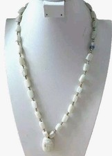 Gemstone necklace / light yellow green color of stones/ gold tone beads between