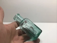 Antique Eiffel Tower Fruit Juices Bottle.