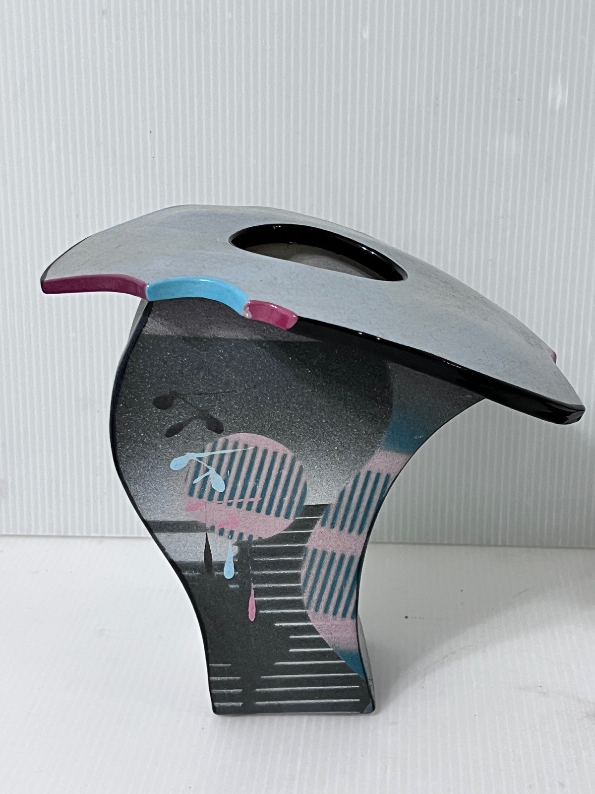 Signed studio pottery vase in Memphis-style asymmetric design