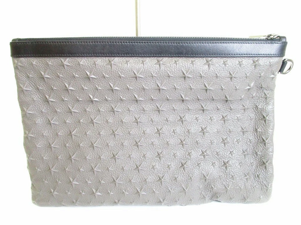 Auténtico bolso clutch Jimmy Choo estrellas en relieve gris y negro de cuero #8059 Foto 2 de 4