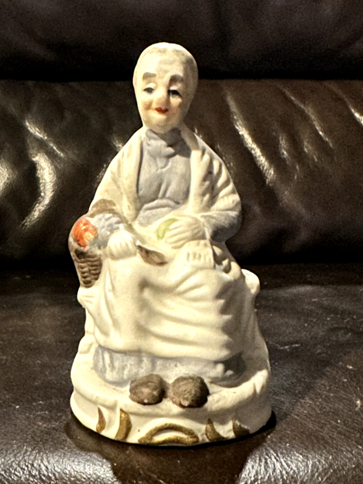 Vintage Ceramic Figurine -Old Woman Sitting On Bench Peeling Apples Potatoes 5”h