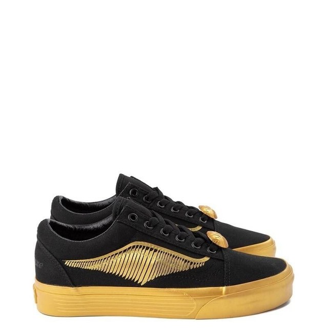 gold black vans