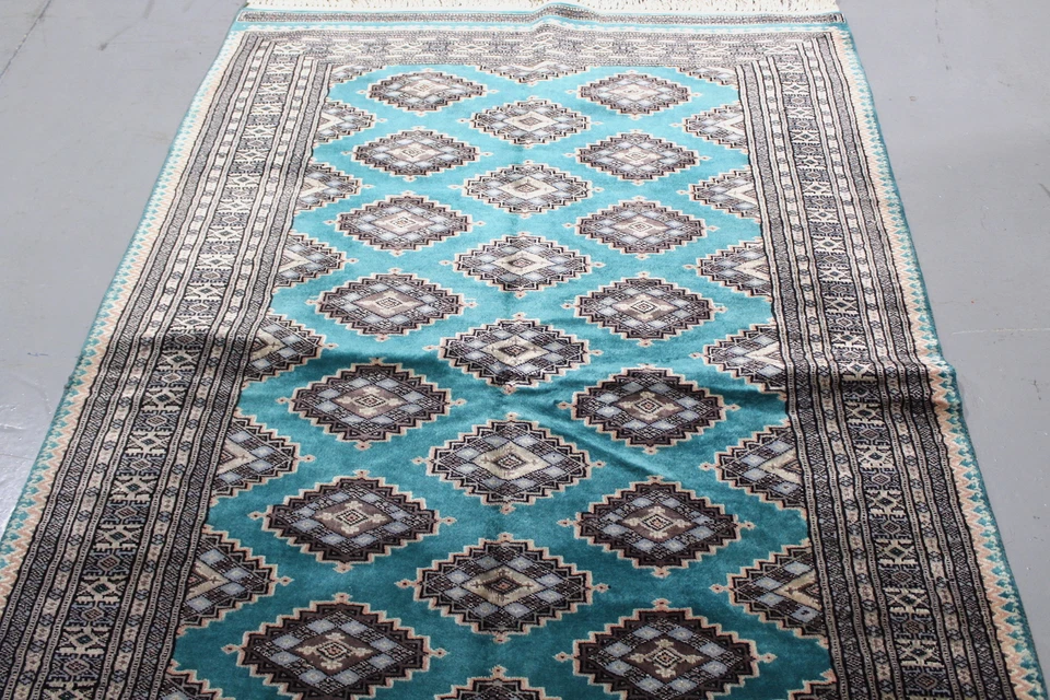 Alfombra hecha a mano Bokhara verde azulado Pakistán 3' 12" x 5' 10" alfombra azul anudada a mano Foto 3 de 4