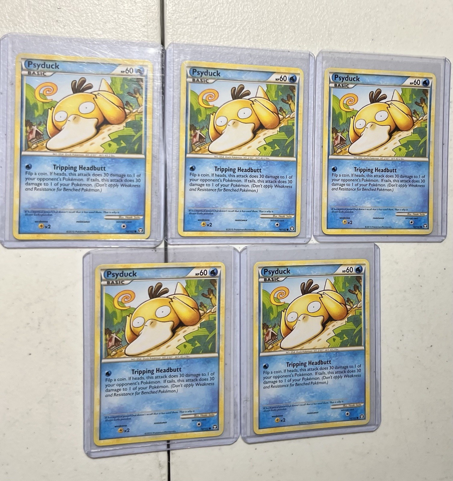 1 x  Psyduck 74/102 NON-HOLO TRIUMPHANT 2010 Pokemon Card Heart Gold Soul Silver